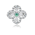 Sterling silver adjustable ring featuring four-leaf clover design with green center moissanite and clear accent stones