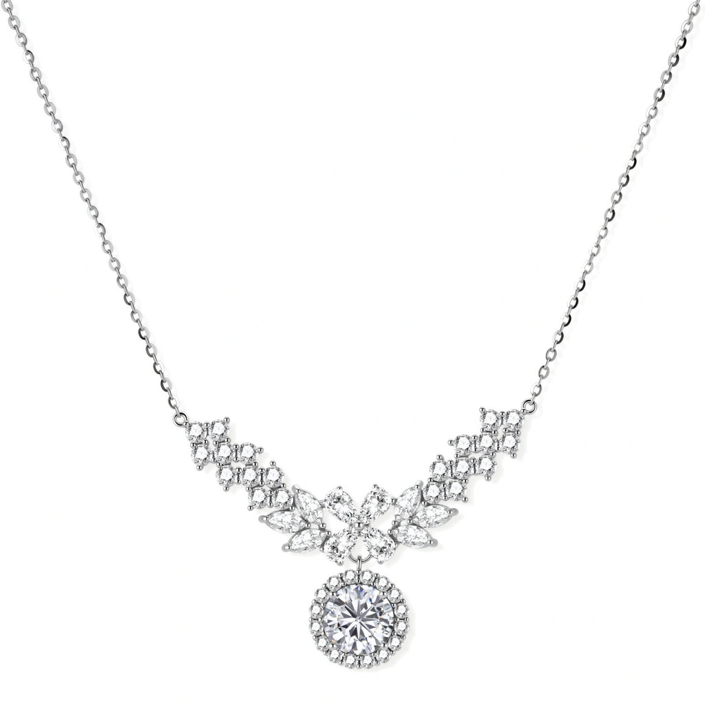 Elegant sterling silver necklace featuring intricate wing-like design with brilliant moissanite stones on neutral background.