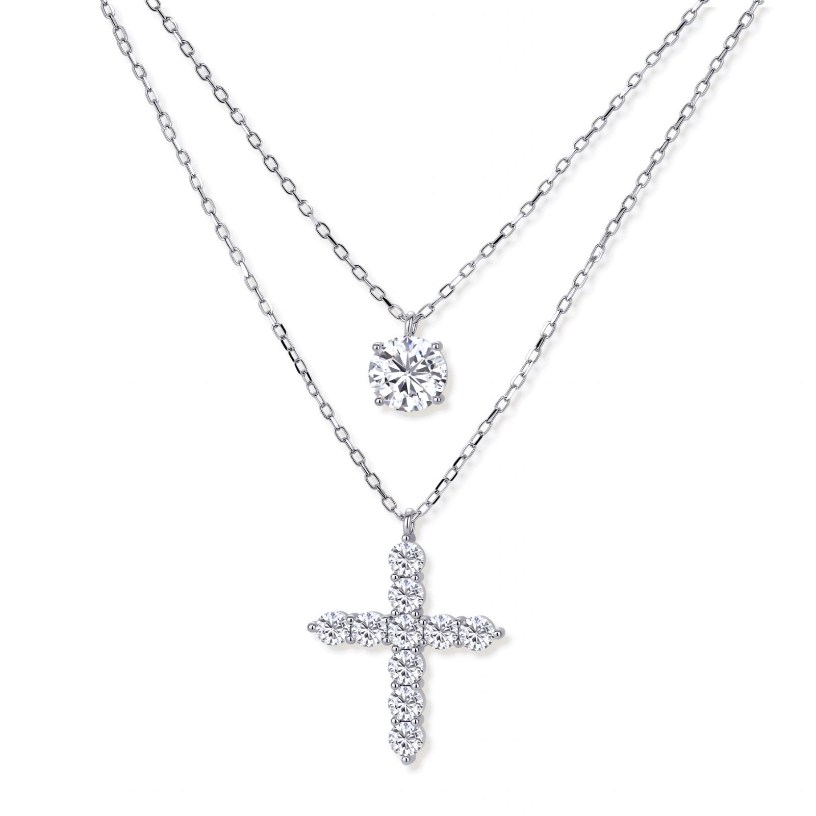 Two delicate sterling silver necklaces with moissanite stones - one solitaire pendant and one cross pendant on white background.