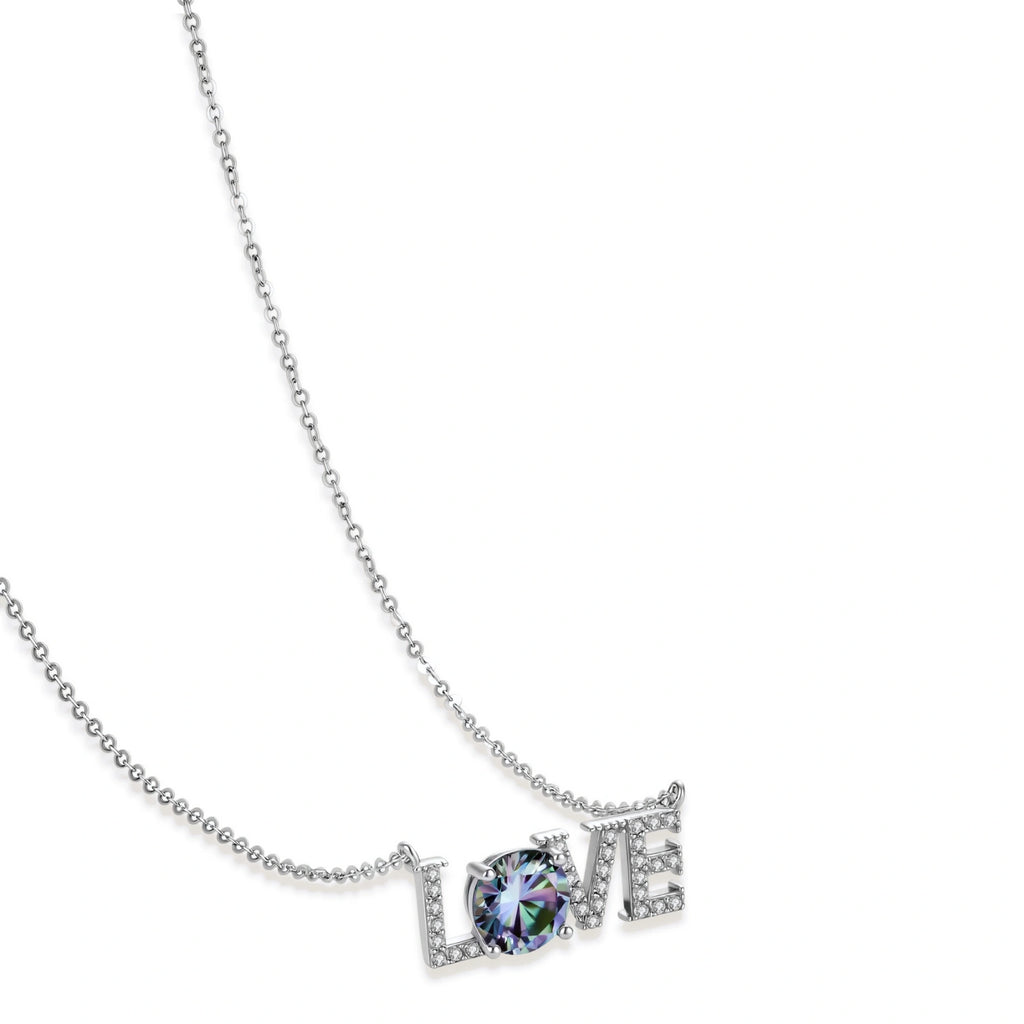 Sterling silver LOVE necklace with brilliant moissanite center stone and pavé details on neutral background.