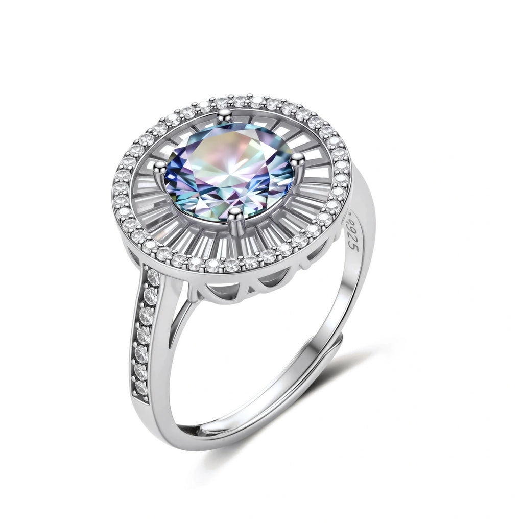 Close-up of sterling silver halo ring with round rainbow moissanite center stone surrounded by baguette-cut stones