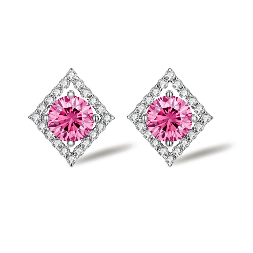 Sterling silver diamond-shaped stud earrings with pink moissanite center stones and crystal halo setting on white background