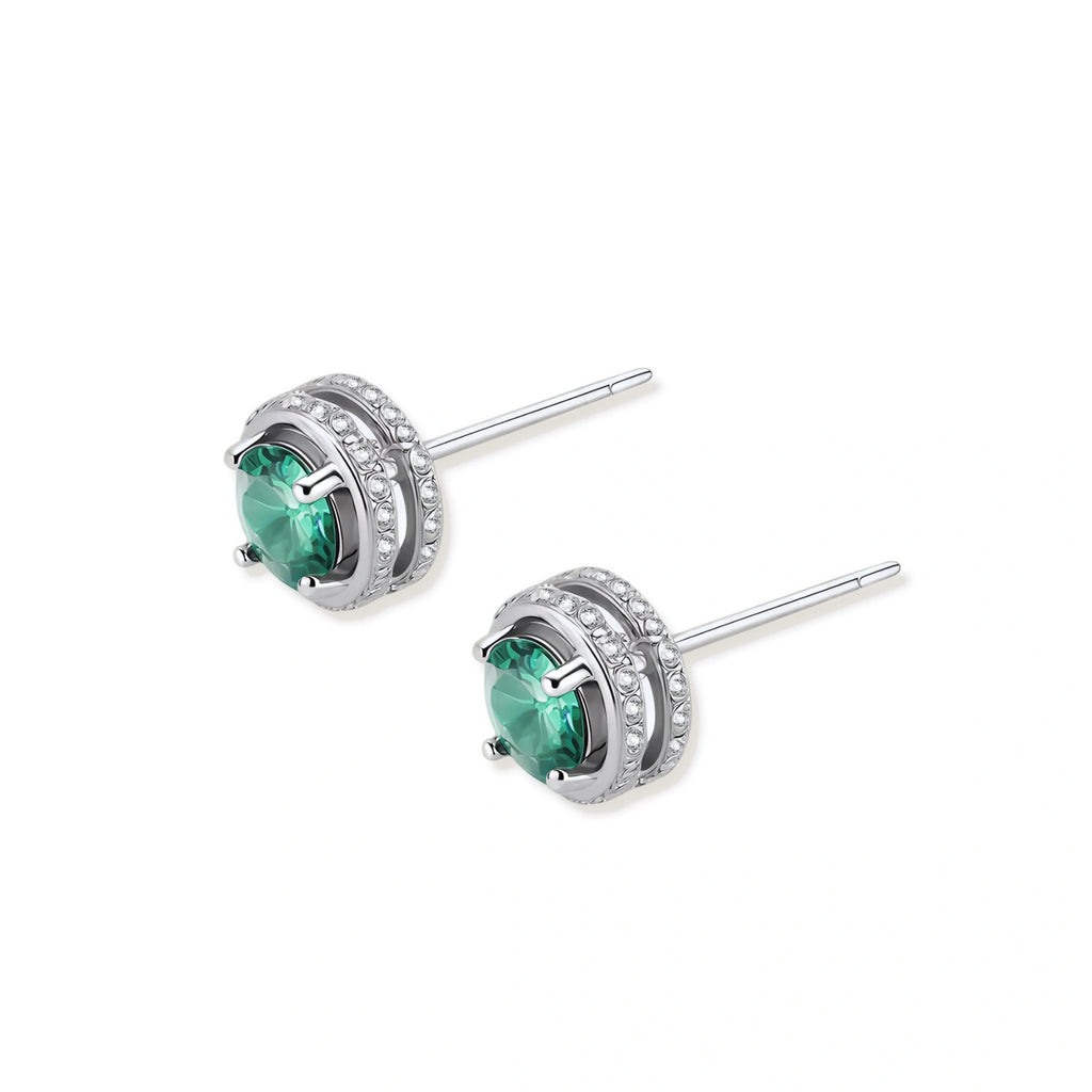 Round green moissanite stud earrings in sterling silver halo settings with brilliant sparkle on white background.