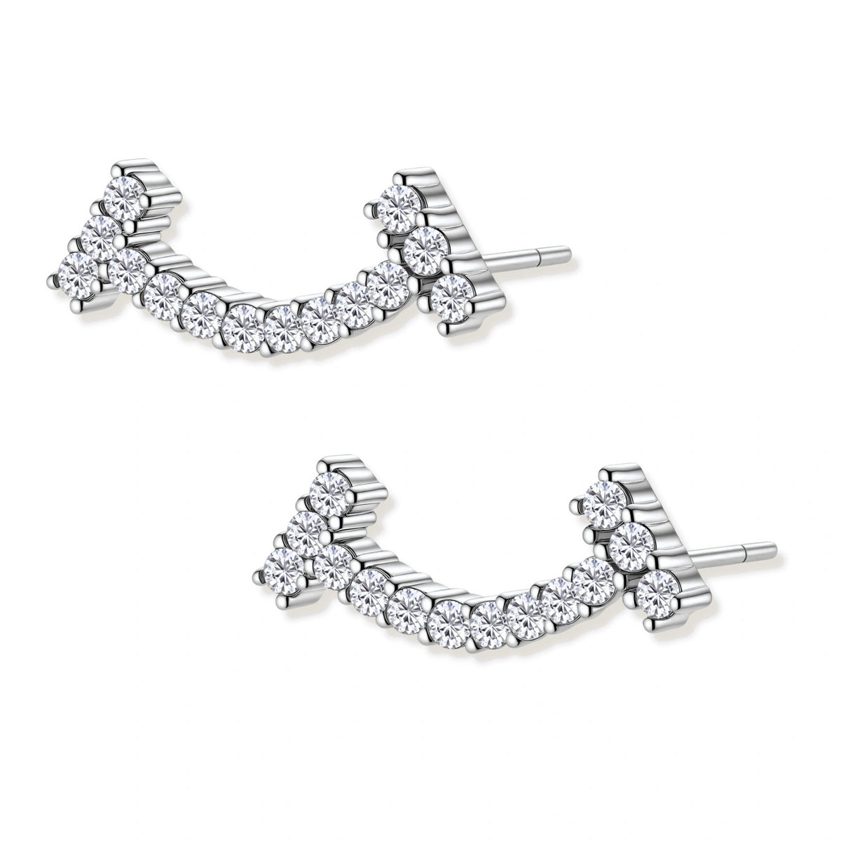 Curved sterling silver ear climbers with moissanite stones arranged in elegant arc shape on white background
