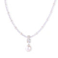 Dainty necklace with lavender crystal beads, freshwater pearls, geometric pendant, and large pearl drop on white background.