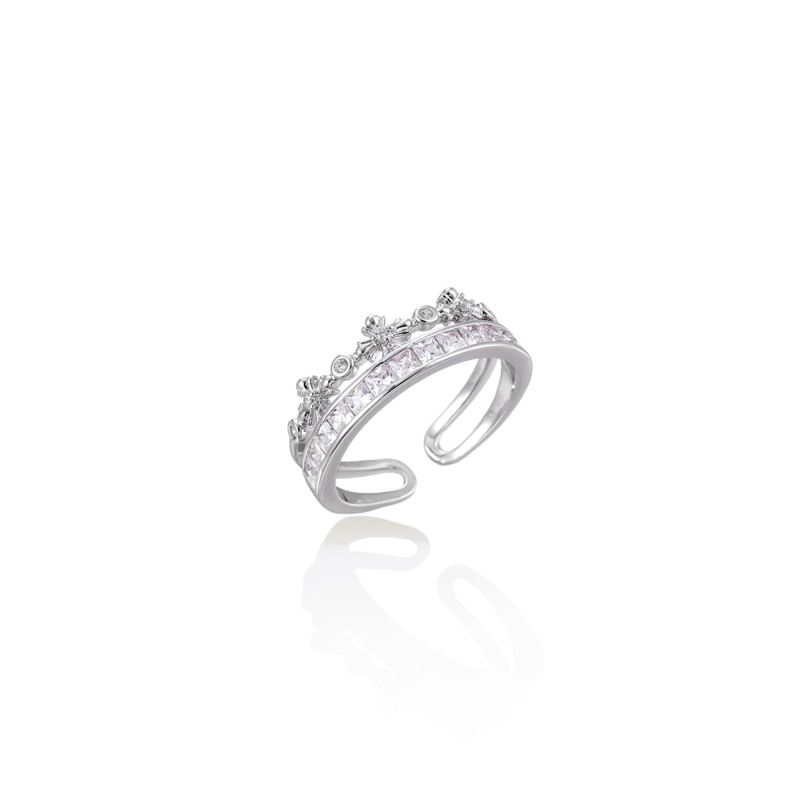 Silver-toned adjustable crown ring with channel-set square zirconia stones and delicate floral details on white background